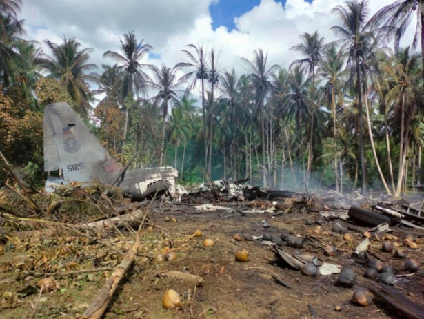 The remains of a Philippine military C-130 plane that crashed in Patikul town, Sulu province, southern Philippines, on July 4, 2021. (Joint Task Force-Sulu via AP)