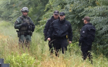 Massachusetts Police ID Suspects in Armed Highway Standoff