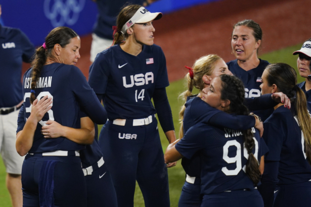 Members of team United States react after a softball game against Japan at the 2020 Summer Olympics in Yokohama, Japan, on July 27, 2021. Japan won 2–0. (Matt Slocum/AP Photo)
