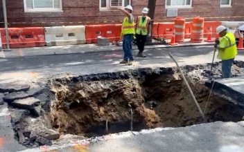 Giant Sinkhole Opens up in NYC, Swallowing Part of Street