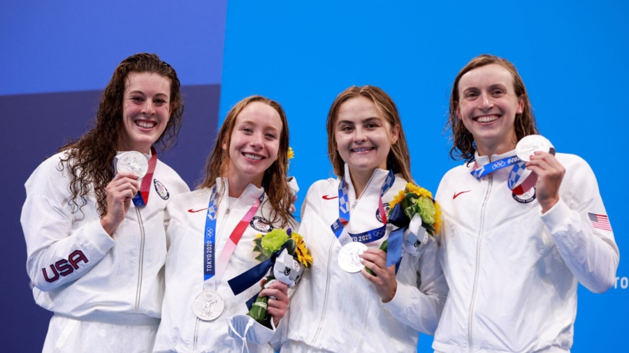 USA Swim Team Collects Olympic Medals