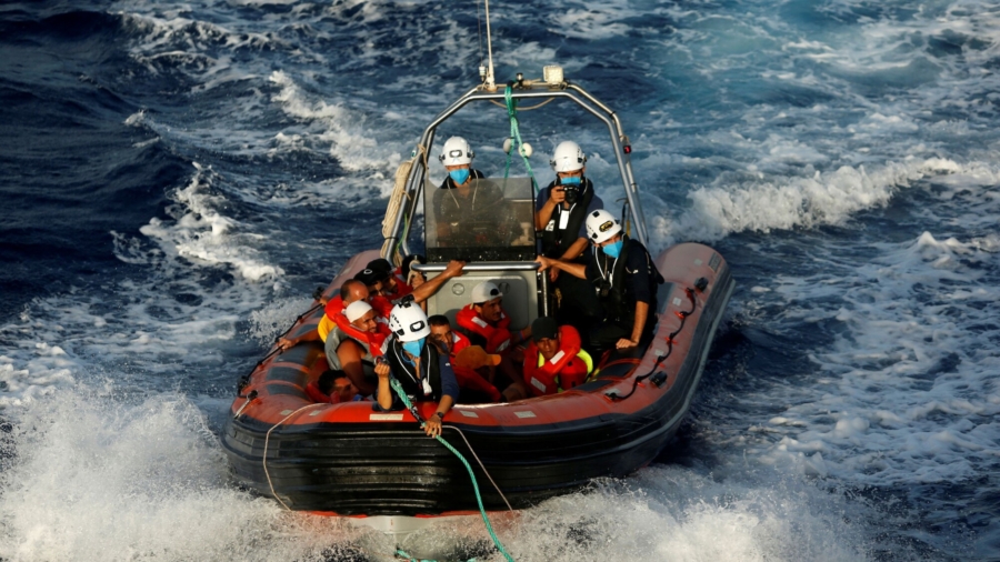 Rescuers Pull 394 Migrants From Dangerously Overcrowded Boat Off Tunisia