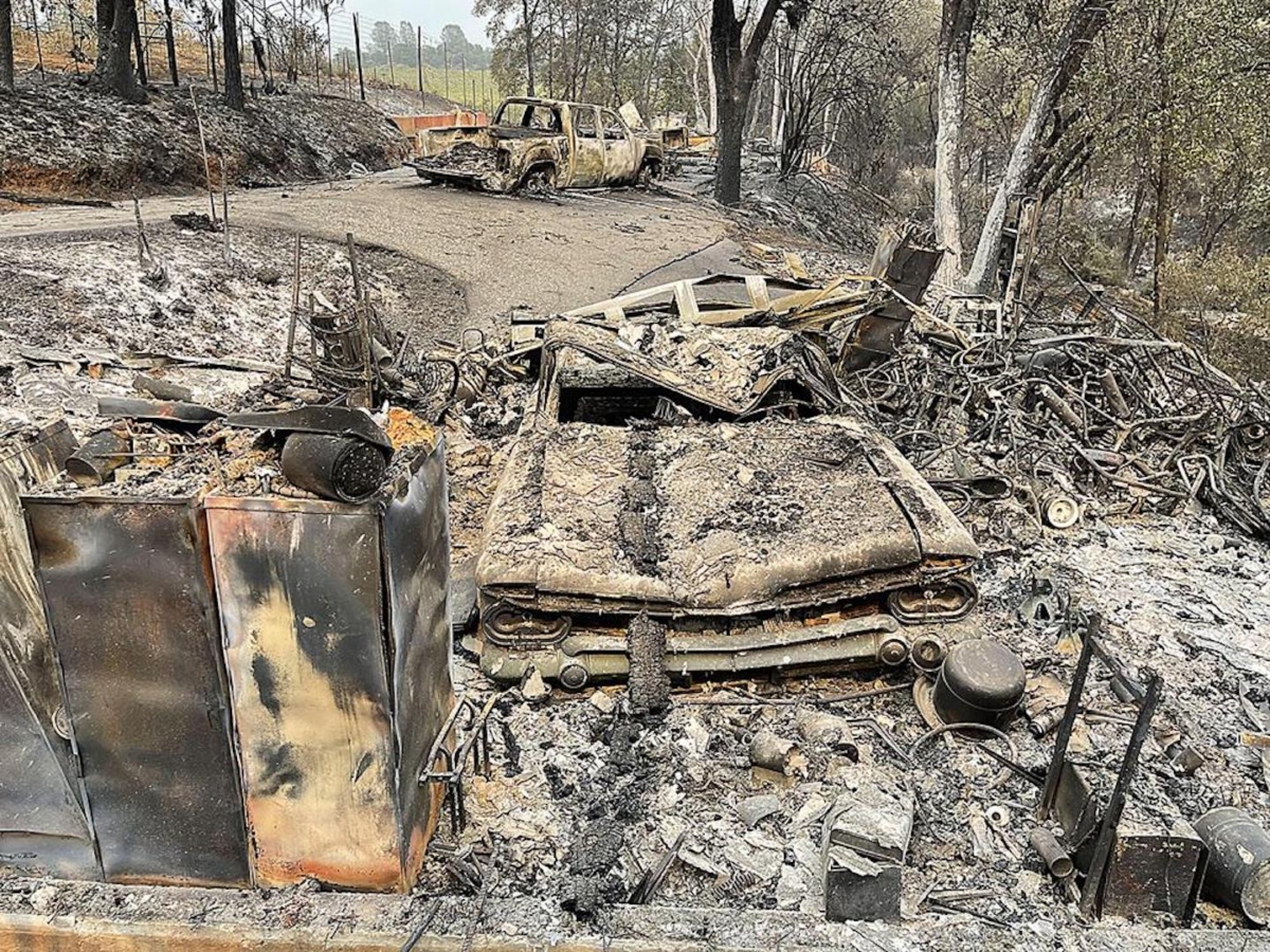 A classic Chevrolet El Camino that was lost along with the home of "Pete" Reyna in Chicago Park on Aug. 7, 2021. (Elias Funez/The Union via AP)