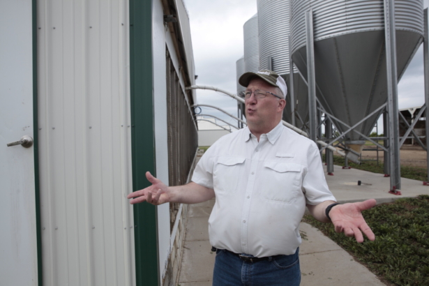 Dwight Mogler explains operations at his family's hog barns in Alvord, Iowa, on July 9, 2021. (Stephen Groves/AP Photo)