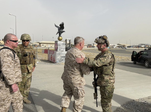 U.S. Marine Corps Gen. Frank McKenzie, the commander of U.S. Central Command, meets with U.S. Navy Rear Adm. Peter Vasely, commander of U.S. Forces Afghanistan-Forward, at Hamid Karzai International Airport, Afghanistan on Aug. 17, 2021. (U.S. Navy photo by Capt. William Urban)