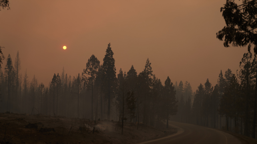 Calmer Weather May Help Crews Battling Fire
