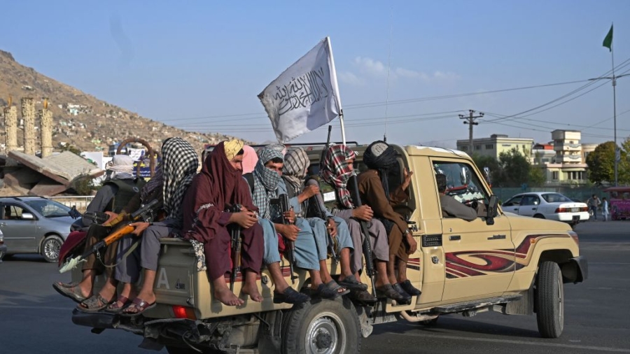 Afghan Photojournalist Warns of Atrocities