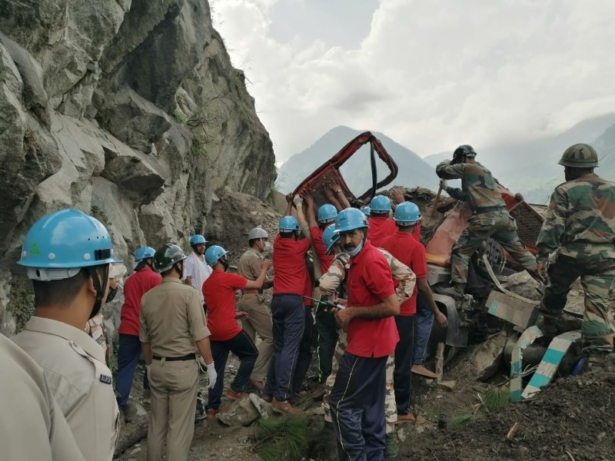 Indo-Tibetan Border Police personnel remove a damaged truck during a rescue operation at the site of a landslide in Kinnaur district in the northern state of Himachal Pradesh, India, on Aug. 11, 2021. (Indo-Tibetan Border Police/Handout via Reuters)