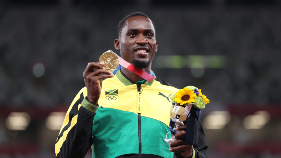 Jamaican Parchment Tracks Down Volunteer Who Helped Him Win Gold