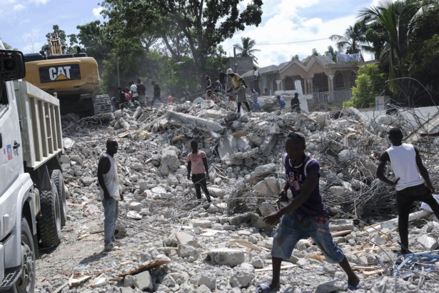 People remove debris