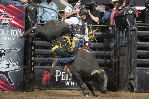 Amadeu Campos Silva rides the bull Yippee High Cowboy in Grand Rapids, Mich., in August 2021. (Andre Silva/Courtesy of PBR/Bull Stock Media via AP)