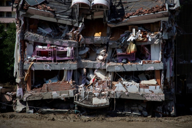 A partly collapsed building hit by flash floods that swept through towns in the Turkish Black Sea region in Bozkurt, a town in Kastamonu Province, Turkey, on Aug. 13, 2021. (Can Erok/Demiroren Visual Media via Reuters)