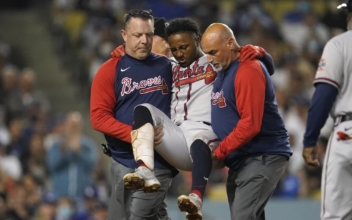 Braves’ All-Star Baseman Carried Off Field After Fouling Ball Off Knee