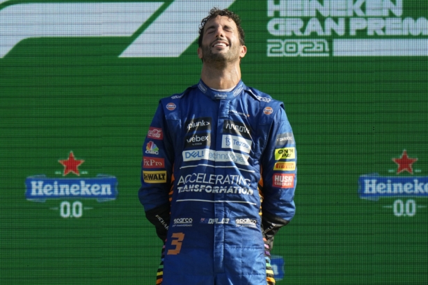 Mclaren driver Daniel Ricciardo of Australia celebrates after winning during the Italian Formula One Grand Prix at Monza racetrack in Monza, Italy, on Sept. 12, 2021. (Luca Bruno/AP Photo)