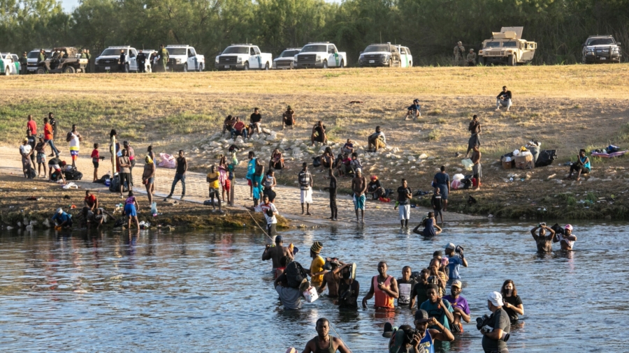 Del Rio Migrant Camp Clearing, Some Released in US