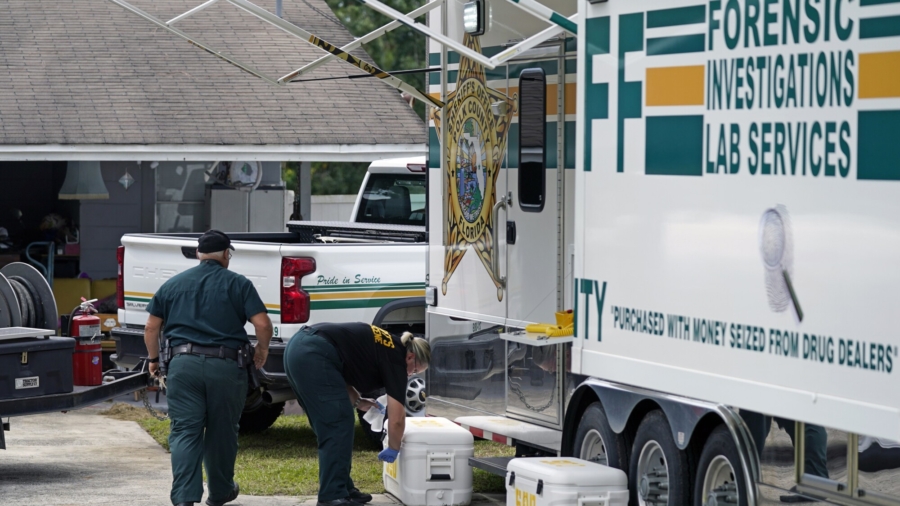 Florida Shooter May Have First Pounded on Neighbor’s Door