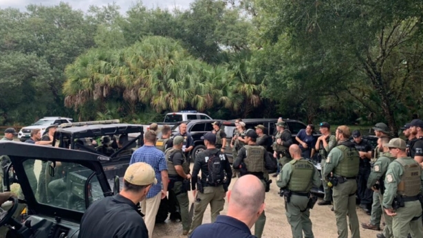 Law enforcement officials conduct a search for Brian Laundrie in the Carlton Reserve in Sarasota, Fla., on Sept. 18, 2021. (North Port Police Department via AP)