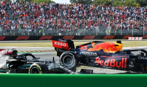 Red Bull's Max Verstappen and Mercedes' Lewis Hamilton crash out of the race at the Italian Grand Prix in Monza, Italy, on Sept. 12, 2021. (Jennifer Lorenzini/Reuters)