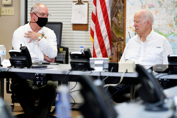 Louisiana Governor John Bel Edwards (L) and President Joe Biden take part in a briefing with local leaders on the impact of Hurricane Ida at the St. John Parish's Emergency Operations Center in LaPlace, La., on Sept. 3, 2021. (Mandel Ngan/AFP via Getty Images)