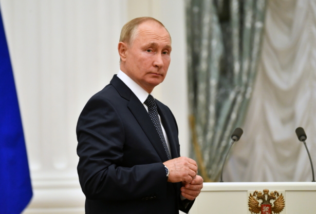 Russian President Vladimir Putin looks on during a meeting with athletes, participants of the 2020 Tokyo Olympic Games, in Moscow, Russia, on Sept. 11, 2021. (Sputnik/Evgeny Biyatov/Kremlin via Reuters)