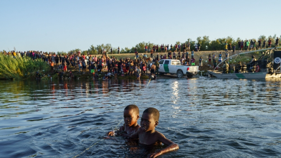 Mayorkas Visits Camp of Illegal Immigrants, Gives Warning