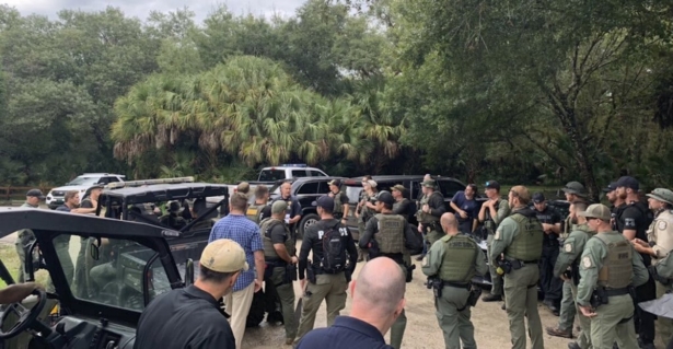 Law enforcement officials conduct a search for Brian Laundrie in the Carlton Reserve in Sarasota, Fla., on Sept. 18, 2021. (North Port Police Department via AP)