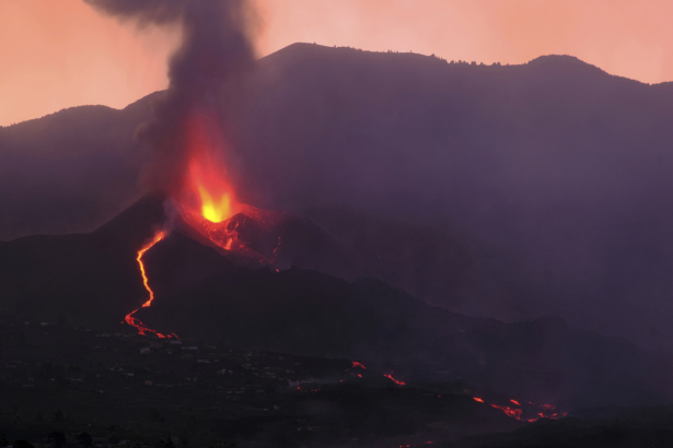 Lava flows from a volcano on the Canary island of La Palma, Spain in the early hours of Sept. 26, 2021. (Daniel Roca/AP Photo)