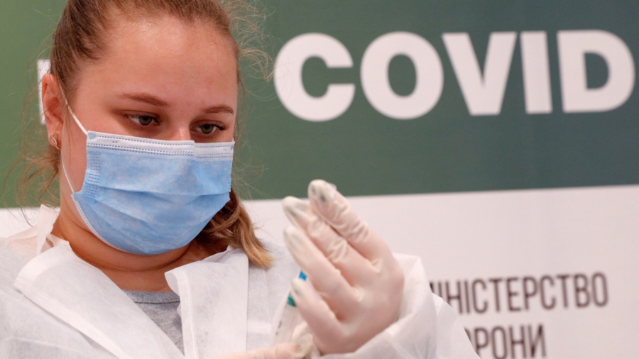 As COVID-19 Toll Surges, Ukraine Cracks Down on Fake Vaccination Certificates