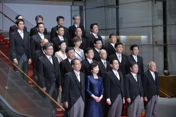 Newly elected Japanese Prime Minister Fumio Kishida (C) poses with his cabinet members at the prime minister's official residence in Tokyo, Japan, on Oct. 04, 2021. (David Mareuil/Pool/Getty Images)