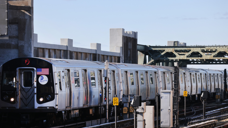 Man Rides NYC Subway—on Top of It