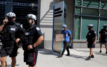 Toronto Says Police Not Vaccinated By Deadline Will Be Put on Unpaid Leave