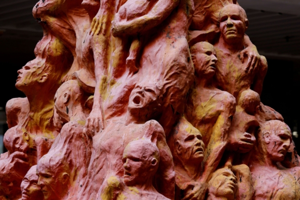 The eight-meter-high (26-foot-high) “Pillar of Shame” by Danish sculptor Jens Galschiot to pay tribute to the victims of the Tiananmen Square massacre in Beijing on June 4, 1989, is seen before it is set to be removed at the University of Hong Kong (HKU) in Hong Kong on Oct. 12, 2021. (Tyrone Siu/Reuters)