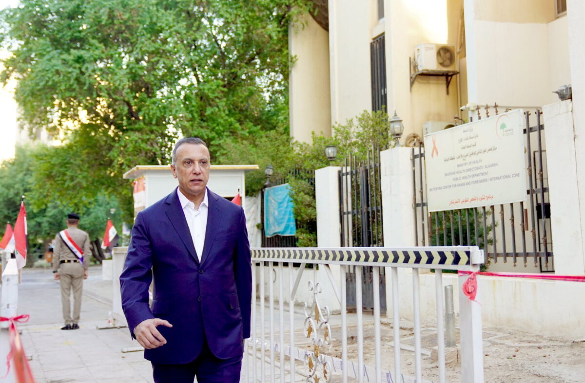 Iraqi Prime Minister Mustafa Al-Kadhimi arrives at a polling station to cast his vote, as Iraqis go to the polls to vote in the parliamentary election, at the Green Zone in Baghdad, Iraq, on Oct. 10, 2021. (Iraqi Prime Minister Media Office/Handout via Reuters)