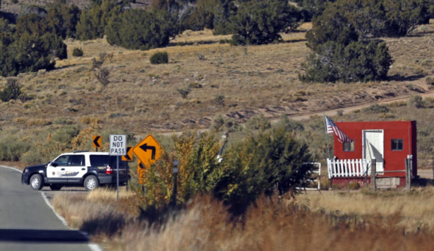 The Santa Fe County Sheriff's Officers respond to the scene of a fatal accidental shooting at a Bonanza Creek Ranch movie set near Santa Fe, N.M., on Oct. 21, 2021. (Luis Sanchez-Saturno/Santa Fe New Mexican via AP)
