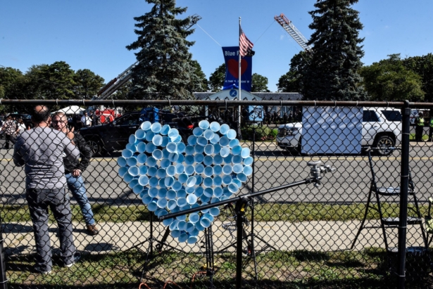 A blue heart is seen across the street from a funeral home where people have gathered to pay respects to Gabby Petito, in Holbrook, N.Y., on Sept. 26, 2021. (Stephanie Keith/Getty Images)