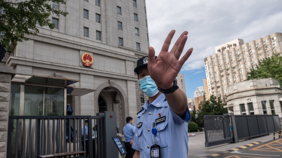 China Denies Activist's Mom's Plea to See Son
