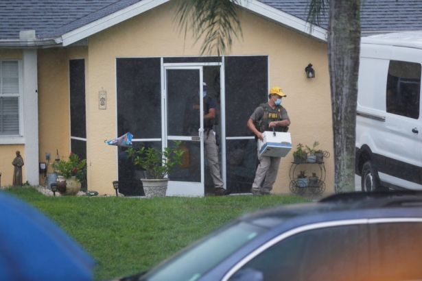 FBI agents begin to take away evidence from the family home of Brian Laundrie, in North Port, Fla., on Sept. 20, 2021. (Octavio Jones/Getty Images)