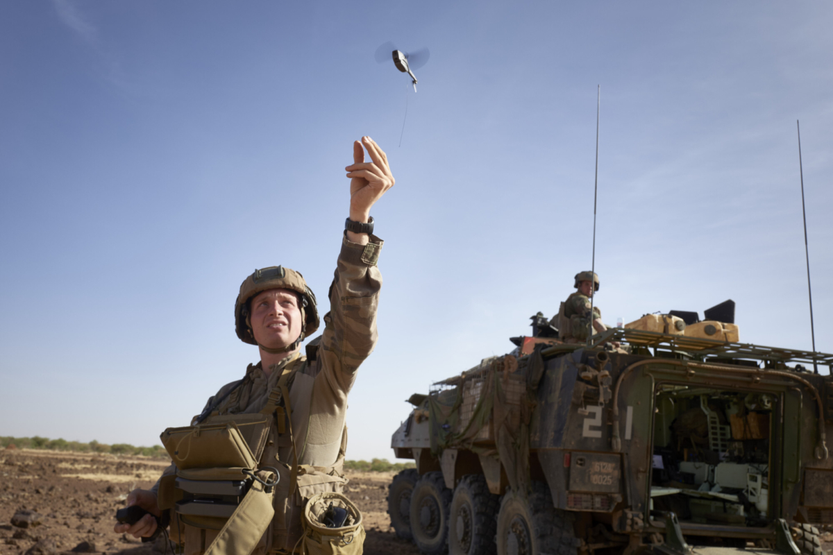 A soldier of the French Army launches a mini-drone used to check the presence of jihadist groups in northern Burkina Faso, on Nov. 11, 2019. (Michele Cattani/AFP via Getty Images)