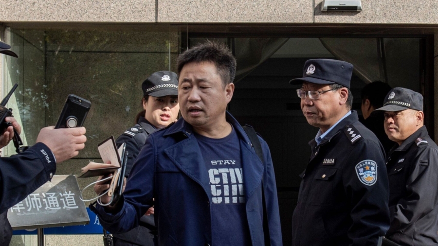 Jailed Chinese Activist's Lawyer Briefly Detained