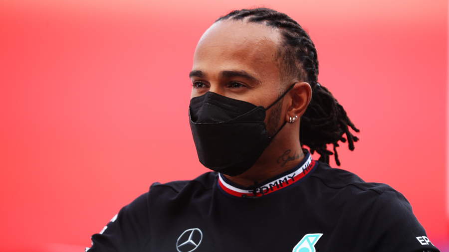 Disguised Hamilton Surprises Children at F1 Headquarters