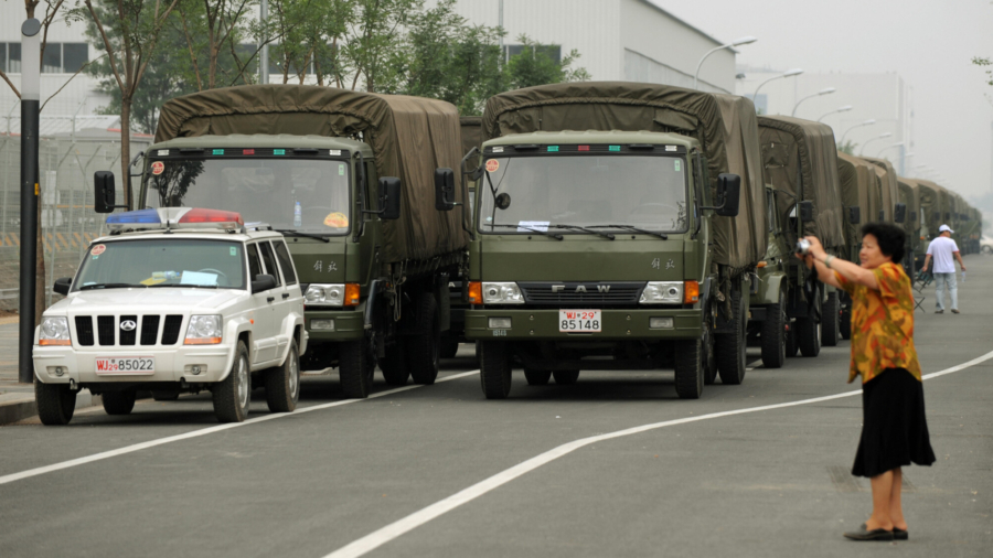Video of Military Trucks in Chinese Cities