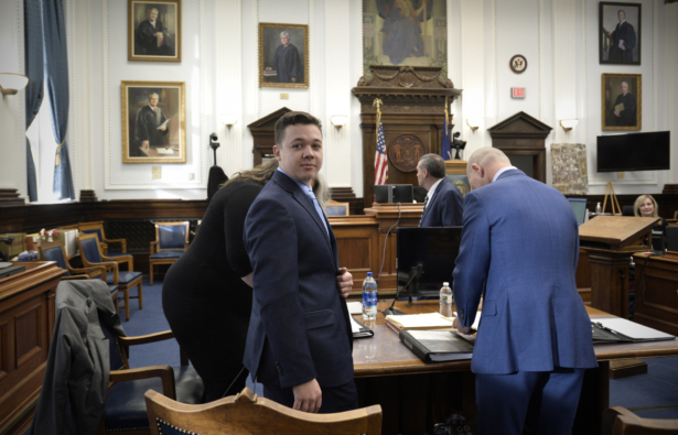 Klyle Rittenhouse (C) makes his way to his seat at the beginning of the day at the Kenosha County Courthouse in Kenosha, Wis., on Nov. 15, 2021. (Sean Krajacic/The Kenosha News via AP, Pool)