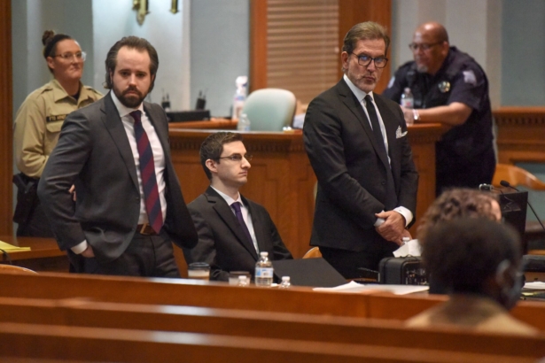 Joseph Elledge (C) sits while his lawyers look in the direction of his mother in court in Columbia, Miss., on Nov. 11, 2021. (Alessia Tagliabue/Pool/Missourian via AP)