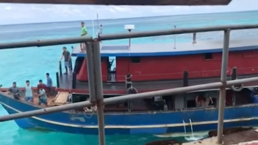 Filipino Boats Reach Marines at China-Guarded Shoal