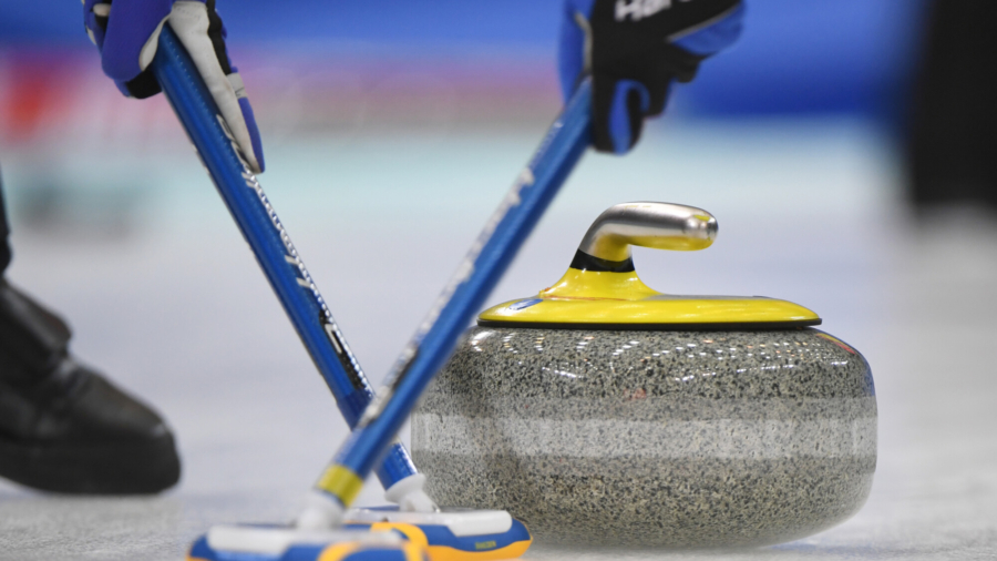 Olympic Fans in DC Take a Stab at Curling