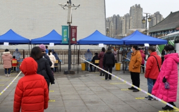 Chinese Megacity Reports Omicron, Prompting Mass Testing And Panic Buying