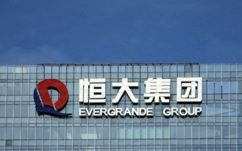 Shares of China Evergrande Suspended as Chairman Under Police Watch