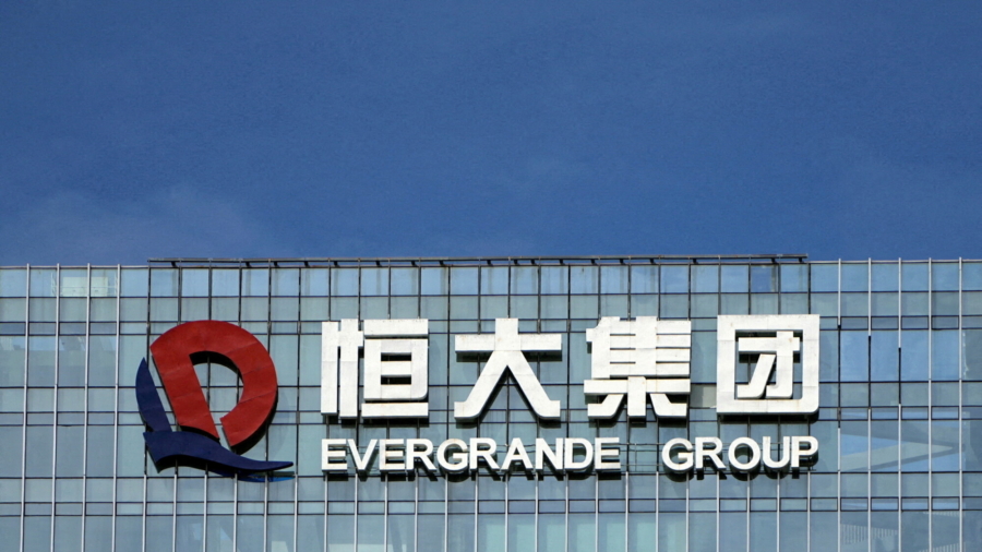 China’s Evergrande Shares Tumble as Hong Kong Trading Resumes