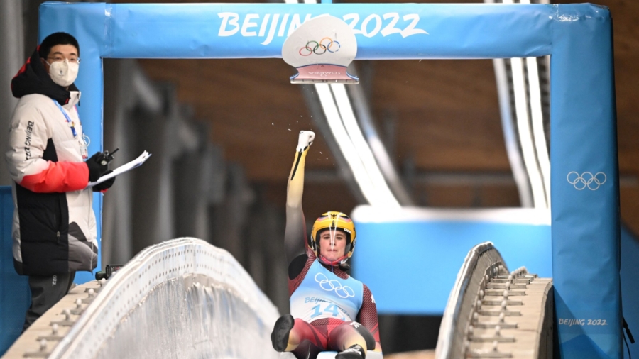 Olympian Opts to Talk About China After Going Home