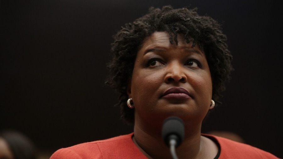 Stacey Abrams Apologizes for Going Maskless in Room Full of Masked Children